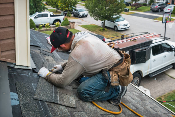 Professional Flat Roof Repair technician working in Warrington, PA